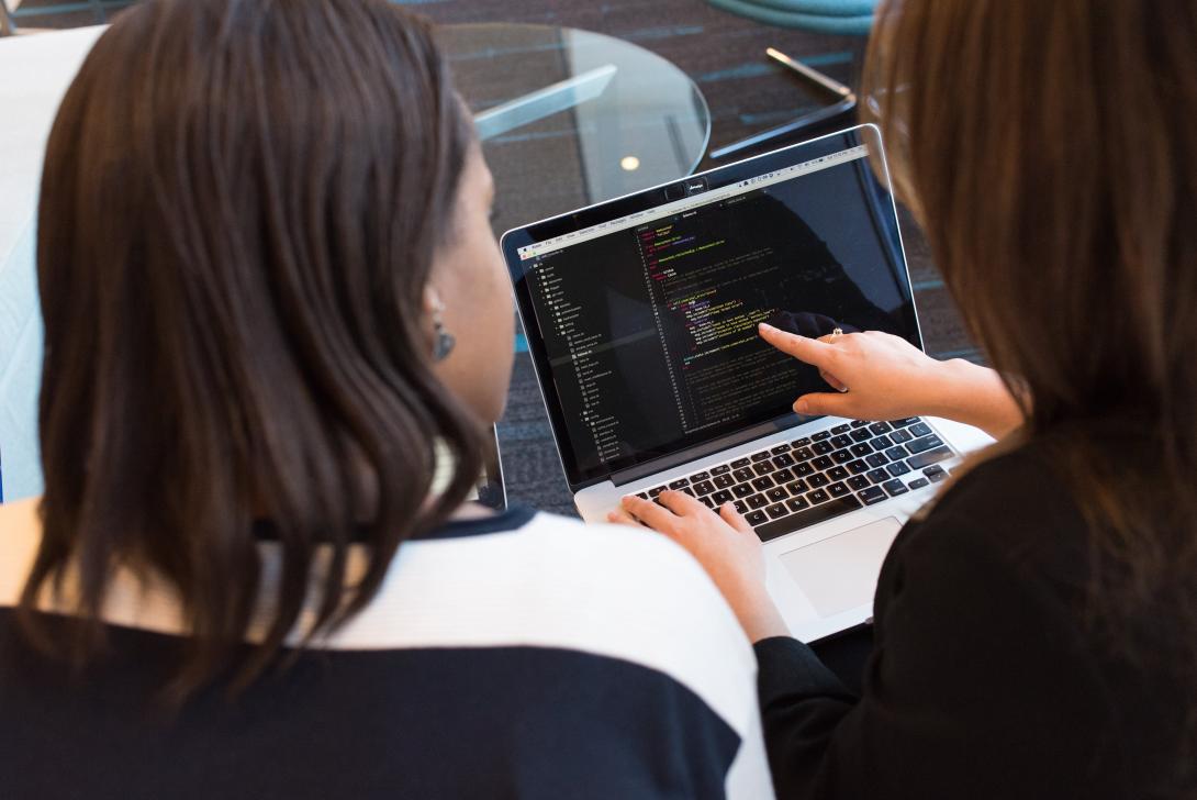 two women using a computer