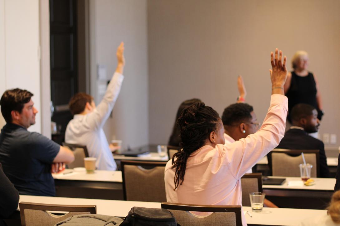 Hands Raised in Classroom 2