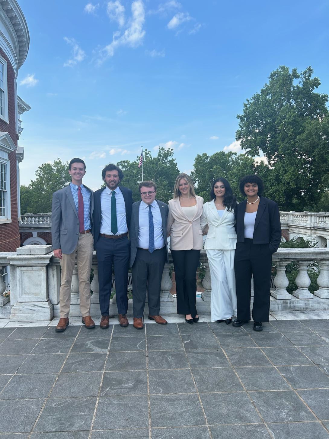 2025 Youth Program Managers standing together at the UVA Rotunda