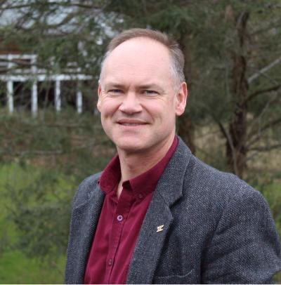 headshot of a man (Adam Downing)