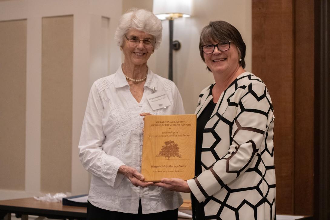 Wingate Mackay-Smith (left) receiving award from Bettina Ring (right)